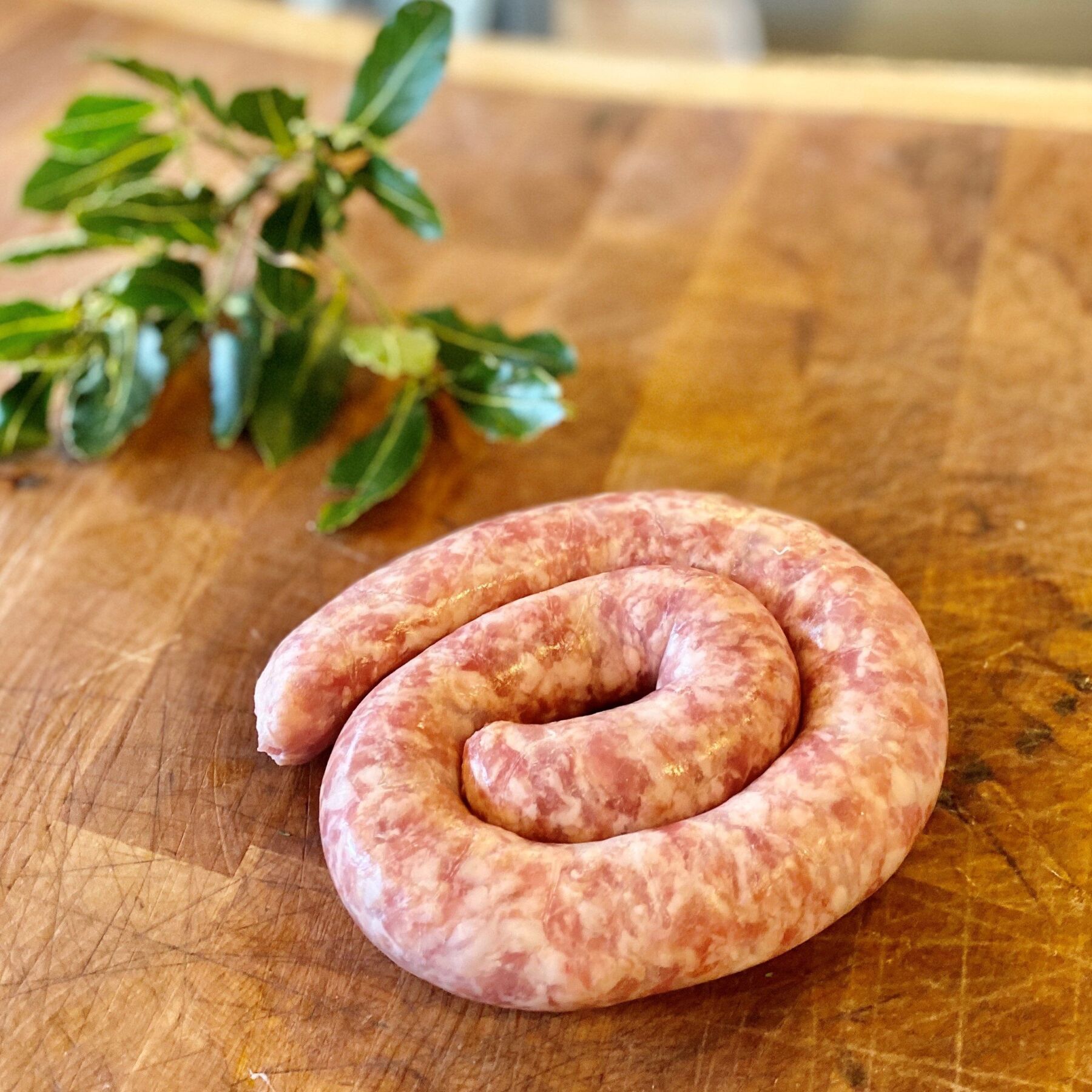 circle Thick Cumberland Sausage